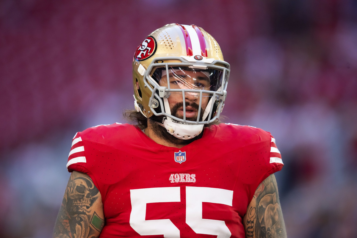 Dec 17, 2023; Glendale, Arizona, USA; San Francisco 49ers guard Jon Feliciano (55) against the Arizona Cardinals at State Farm Stadium.